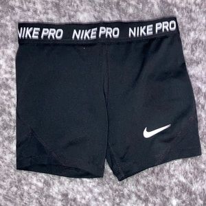 Nike spandex, color black, woman’s size large(fits like a small